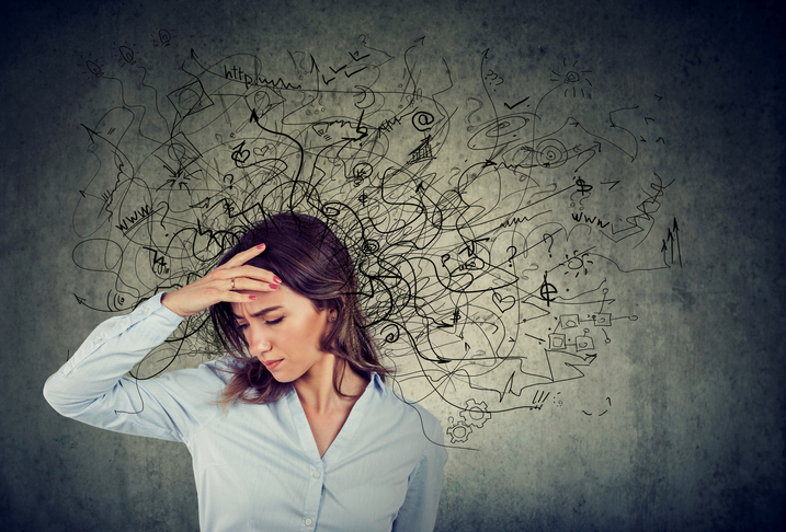 Thoughtful stressed woman with a mess in her head